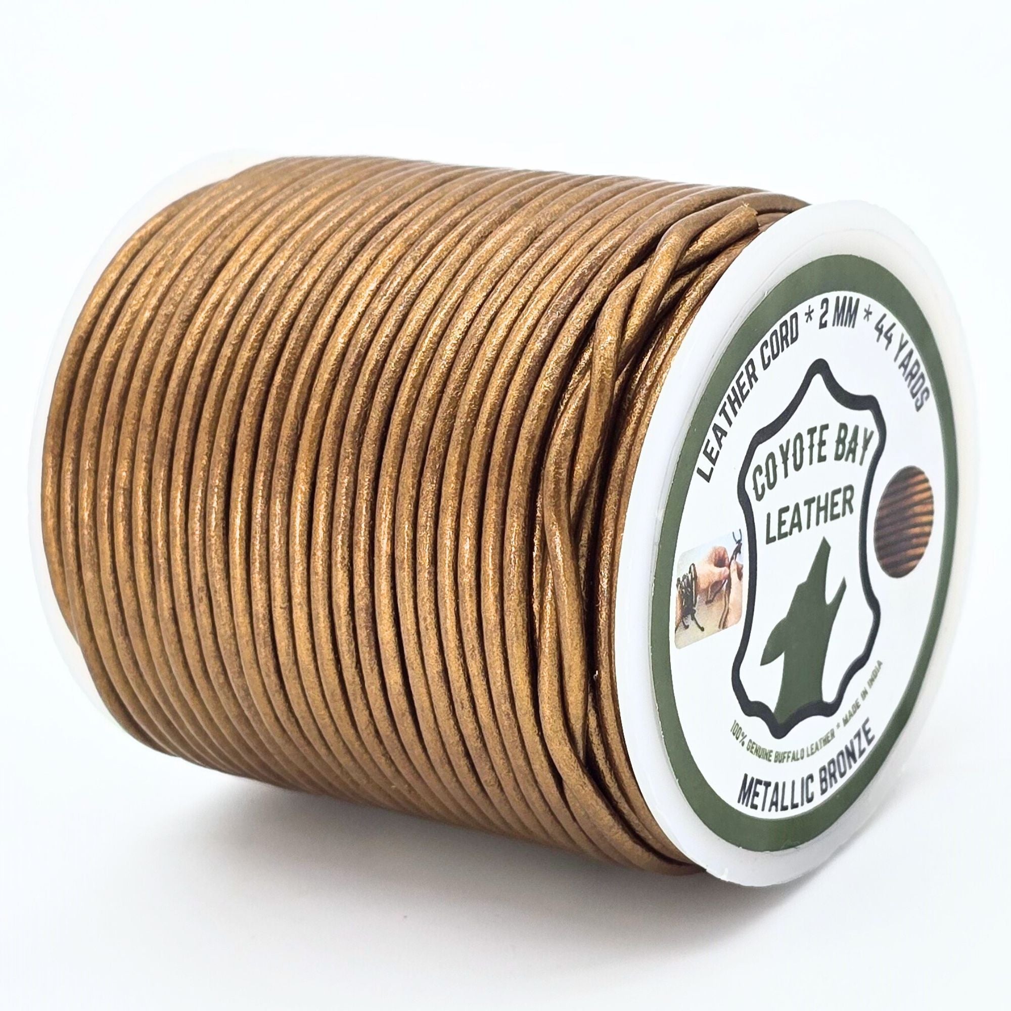 Spool of metallic bronze leather cord with Coyote Bay Leather label on a white background